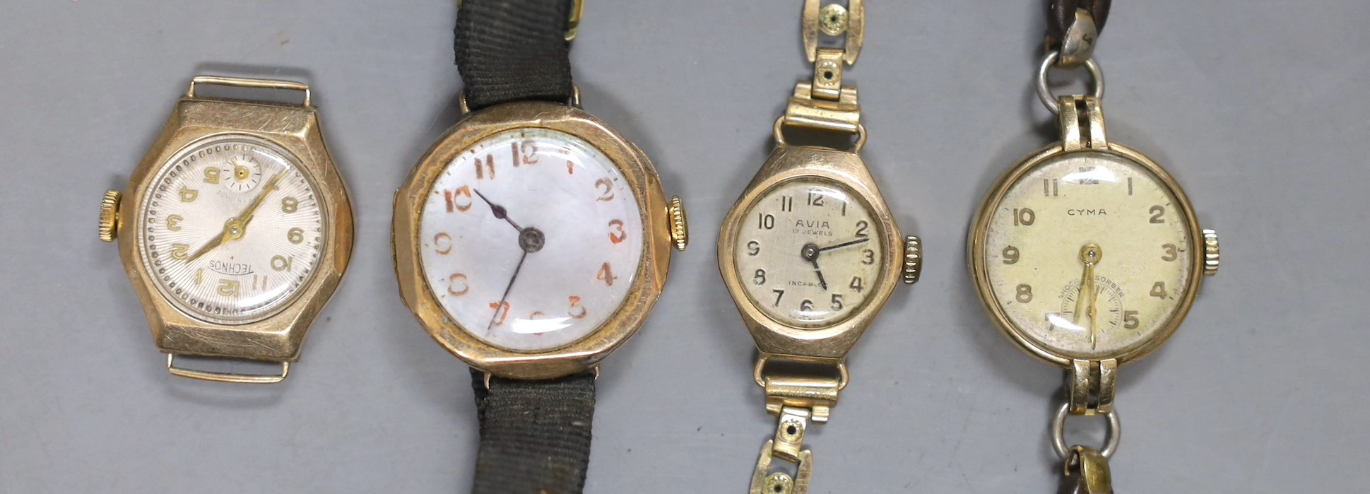 Four lady's assorted yellow metal manual wind wrist watches, including Cyma and Avia, two stamped 9ct gold.